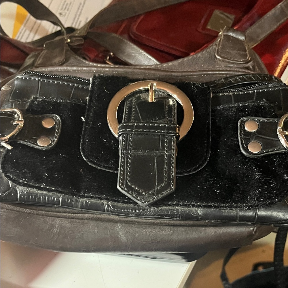Stylish Black Shoulder Bag with Silver Accents